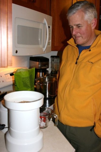 Barely able to contain his joy at finally having a grain mill. 